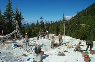 073001 4+600 Loading and blowing holes 2.JPG