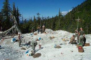 073001 4+600 Loading and blowing holes.JPG