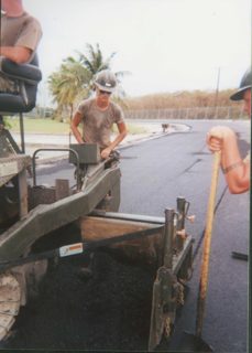 RUNNING THE SCREED.JPG